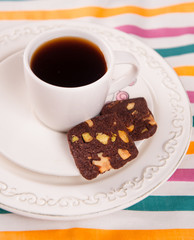 freshly prepared cup of coffee with  cookies