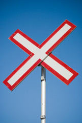 x-shaped sign