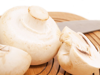 Champignon mushroomes  at the  cutting board