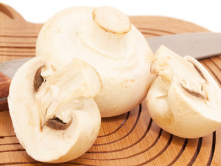 Champignon mushroomes  at the  cutting board