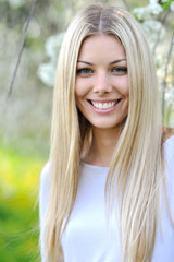 Beautiful smiling blond woman portrait