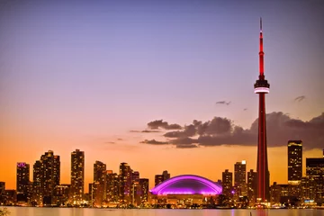 Foto op Canvas Uitzicht op het stadsbeeld van Toronto tijdens zonsondergang © Aqnus