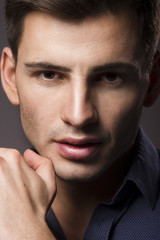 Naklejka premium Portrait of a happy young businessman in shirt