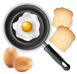 Omelet in frying pan with bread and egg