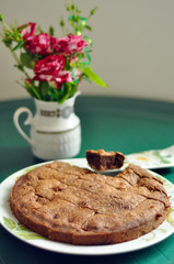 Beautiful roses and a chocolate cake