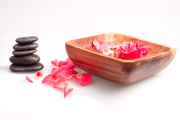 Massage stone with rose petal