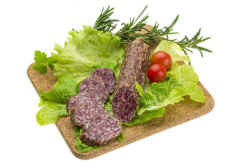 Salami with rosemary, salad and tomatoes