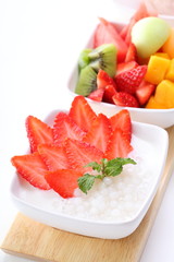 strawberry and fresh fruit on coconut