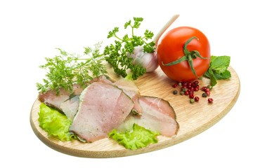Ripe fresh ham with vegetables