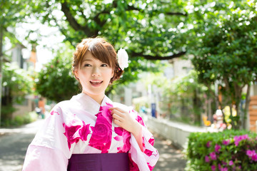 Beautiful young woman wearing japanese traditional kimono