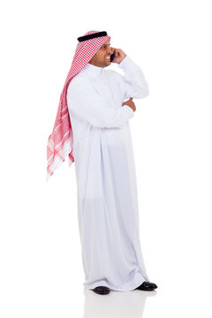 muslim man talking on cell phone