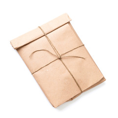 Envelope tied with a rope isolated on white background