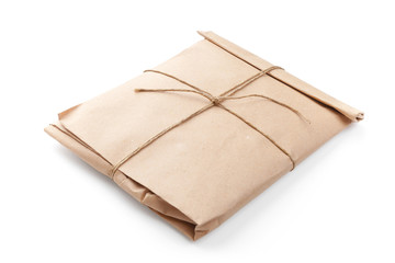 Envelope tied with a rope isolated on white