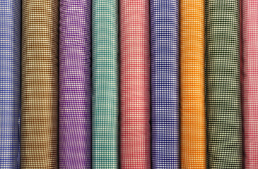 Tubes of Colorful Square Patterned Fabrics