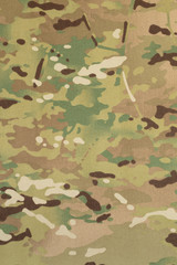 Armed force multicam camouflage fabric texture background © wirojsid