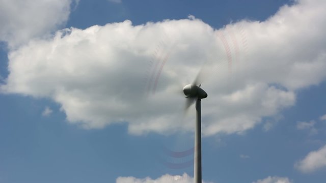 wind turbine on sunny and windy day