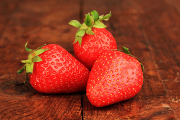 Fresh strawberry on wooden background