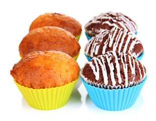 Sweet cupcakes isolated on white