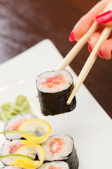 sushi with chopsticks
