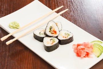 Fototapeta na wymiar sushi with chopsticks
