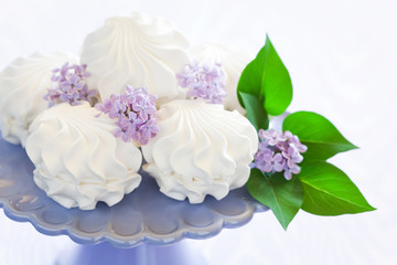 Marshmallow (zephyr) on cake stand, selective focus