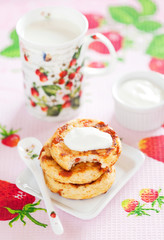 Cottage cheese pancakes with goji berries, selective focus