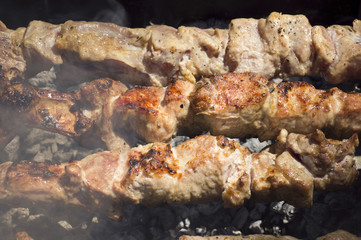 The meat on the open fire