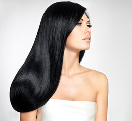 Beautiful  woman with long straight hairs