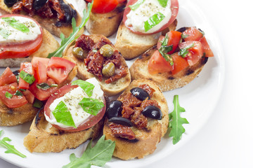 bruschetta, mozzarella, dried tomatoes..