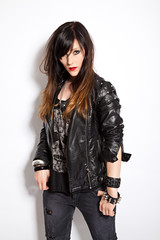 portrait of a beautiful young woman with leather jacket