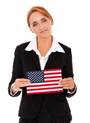 Geschäftsfrau hält Flagge der USA