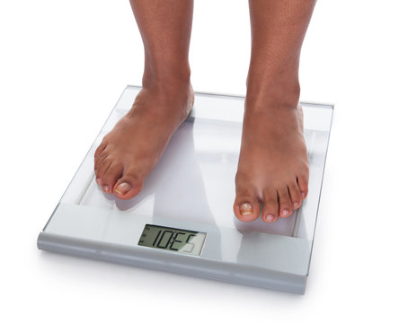Low Section Of A Young On A Weighing Scale