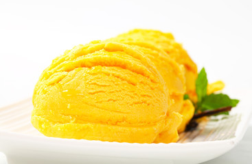 Scoop of yellow ice cream