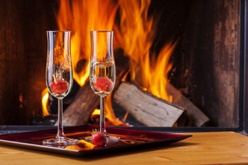 strawberrys splahing into champagne flutes