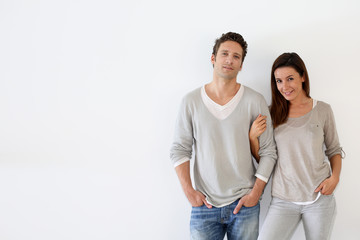 Fototapeta premium Couple standing on white background