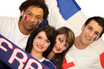 Two couple supporting French football