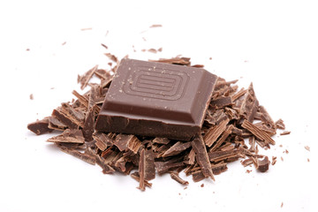 chocolate pieces stacked on white background