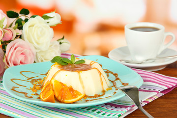 Panna Cotta with orange zest and caramel sauce,