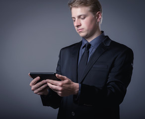young businessman using a digital tablet