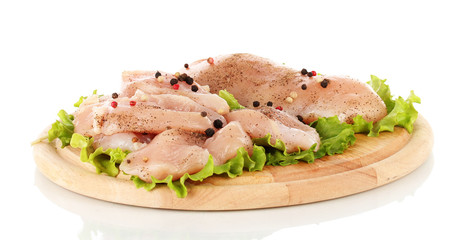 Chicken meat on board isolated on white