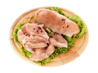 Chicken meat on board isolated on white