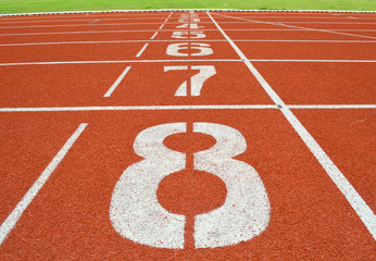 Fototapeta premium numbers on running tracks of outdoor athletic stadium