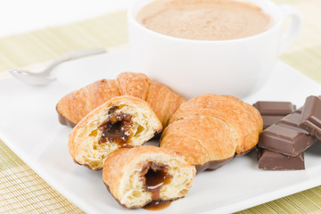 Pain au Chocolat - Chocolate croissants and cappuccino.