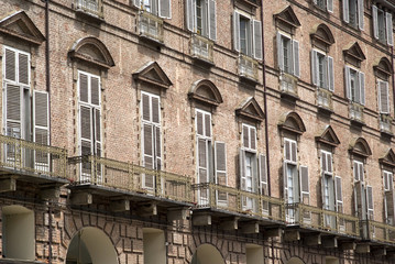 Baroque facade of a building at piazza Castello in Turin, Italy