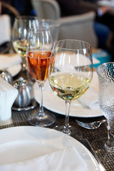 White wine and pink champagne on table