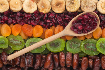 Wooden spoon with cranberries
