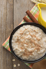 bowl of oatmeal on wood