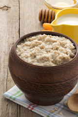 bowl of oatmeal on wood
