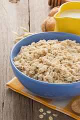 bowl of oatmeal on wood
