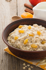 bowl of oatmeal on wood